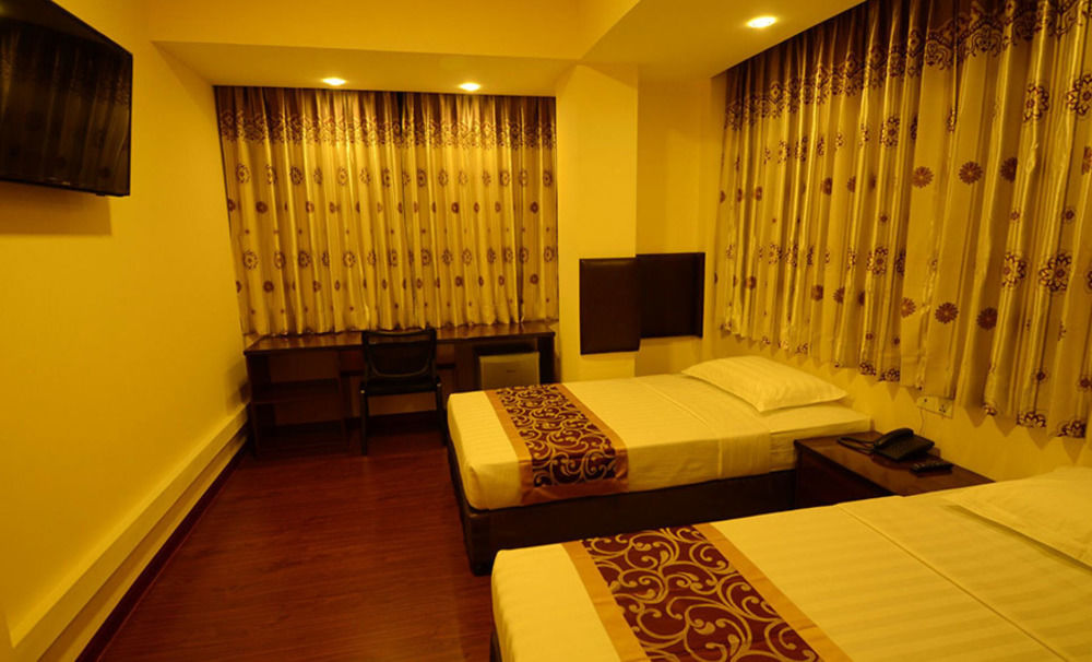 Grace Treasure Hotel Rangum Exterior foto