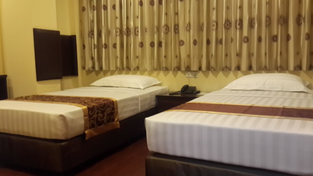 Grace Treasure Hotel Rangum Exterior foto