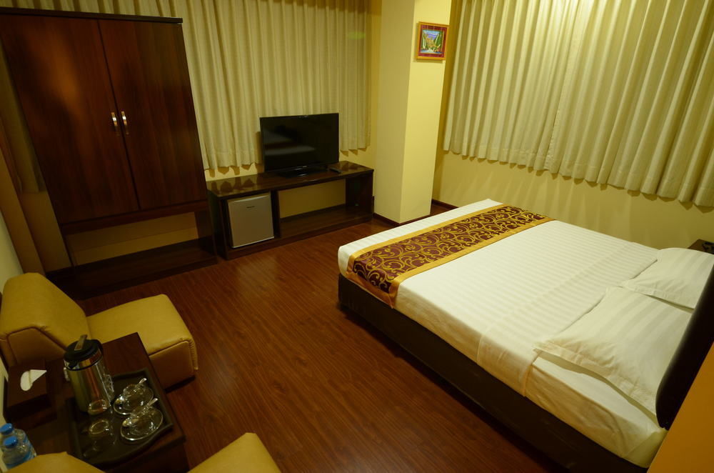 Grace Treasure Hotel Rangum Exterior foto