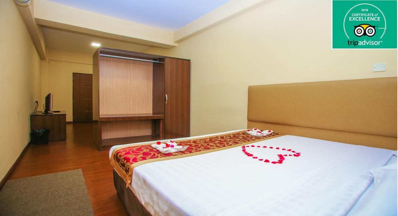 Grace Treasure Hotel Rangum Exterior foto