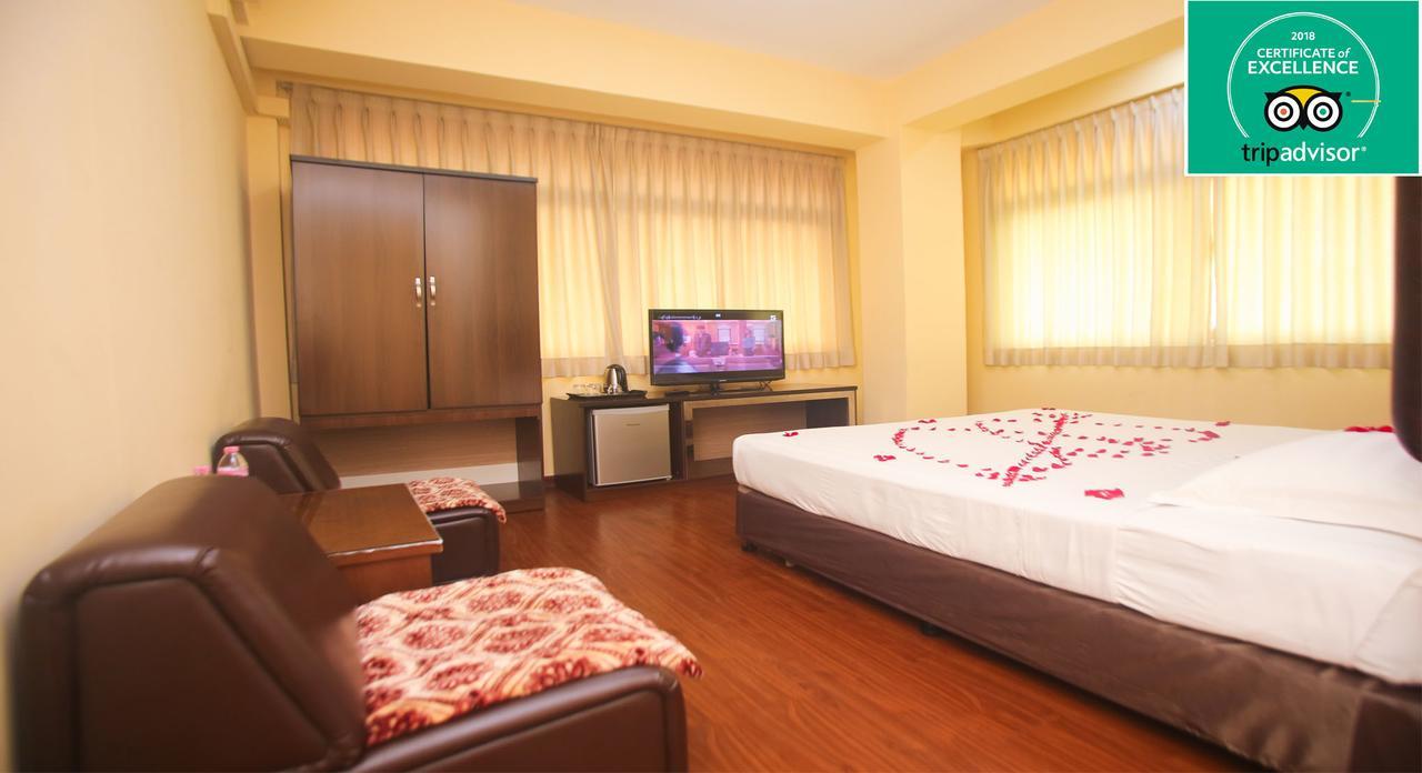 Grace Treasure Hotel Rangum Exterior foto